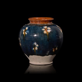 A Chinese Sancai Glazed Pottery Jar, Tang Dynasty 唐 三彩罐
