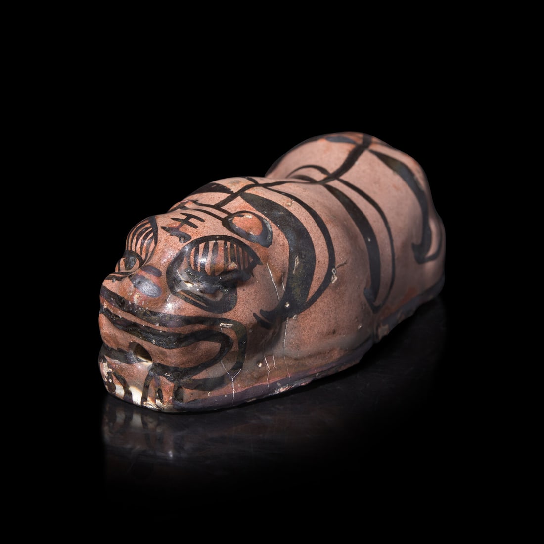 A Chinese Cizhou Glazed Figure of a Tiger 磁州窯臥虎形擺