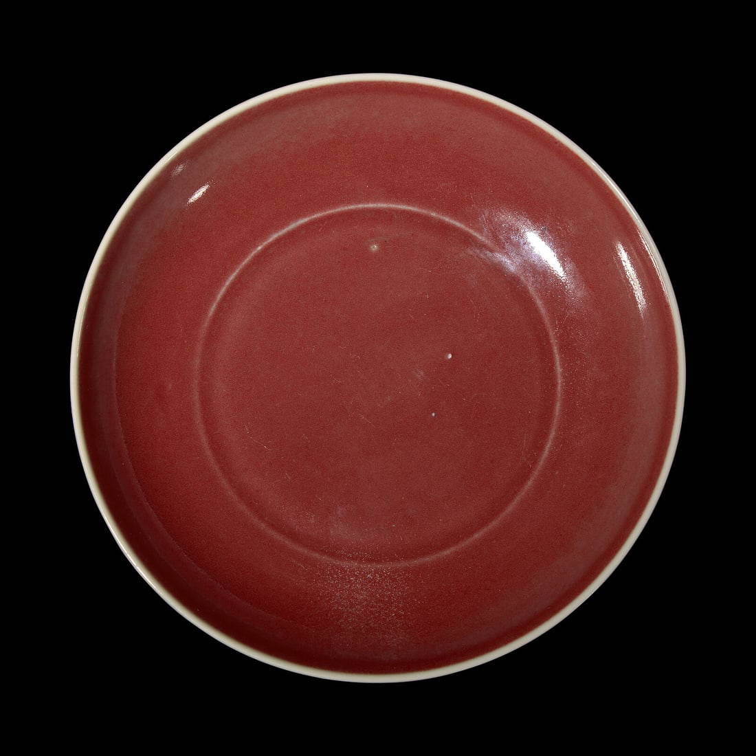 A Chinese Copper Red Glazed Porcelain Dish 霁红釉盘