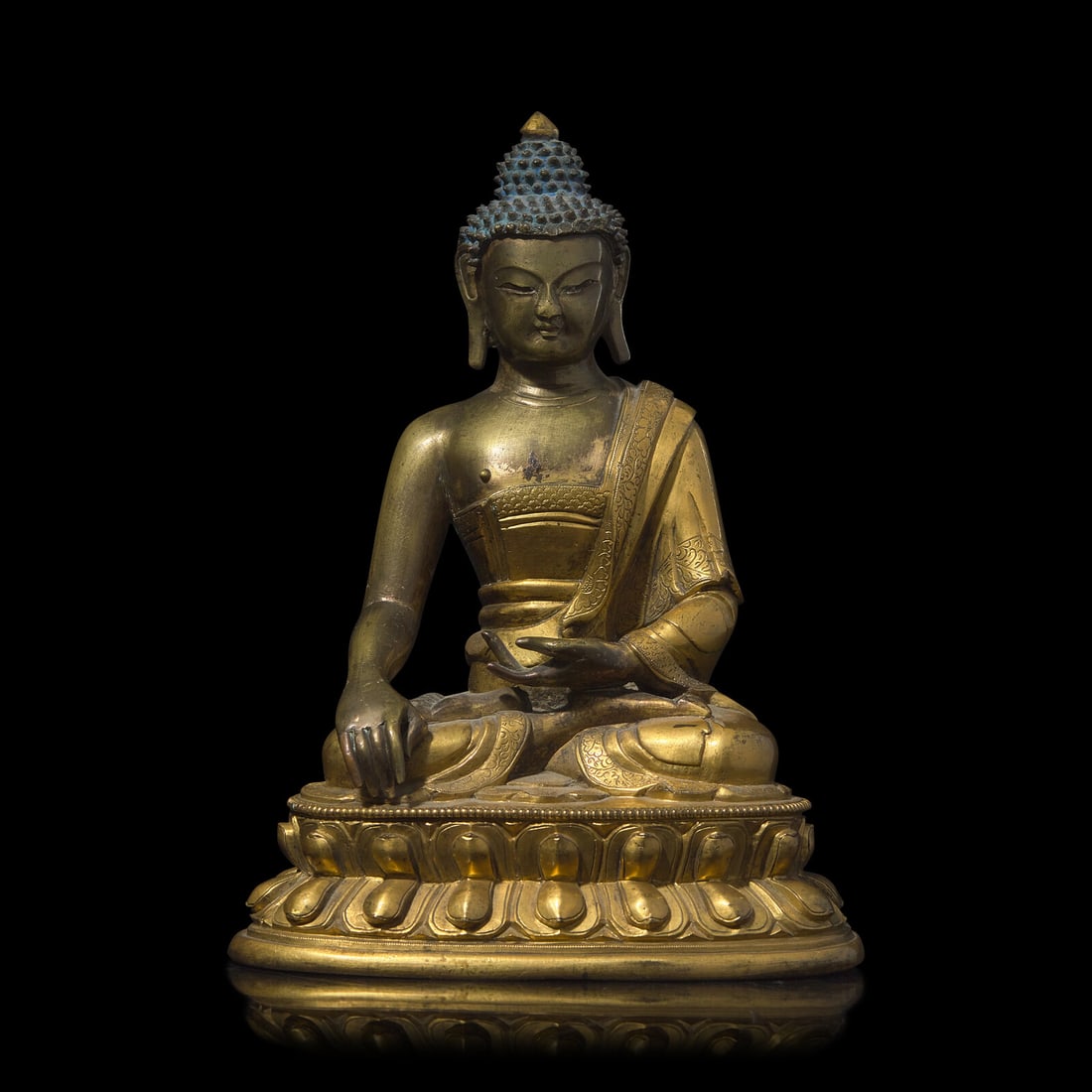 A Sino-Tibetan Gilt Bronze Figure of a Buddha, Qing Dynasty, Probably 18th Century 或十 (1 of 4)