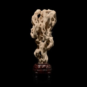 A Chinese White Scholar's Stone with Wood Stand 太湖石及木座