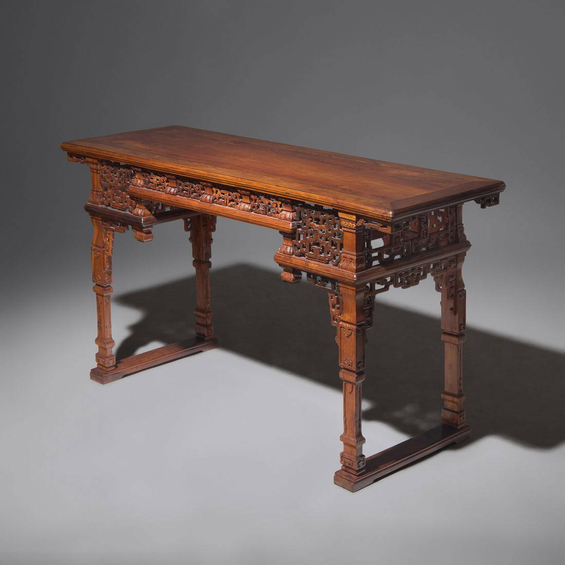 A Chinese Carved Huanghuali Side Table, Tiaozhuo, Late 19th to 20th Century 晚清民