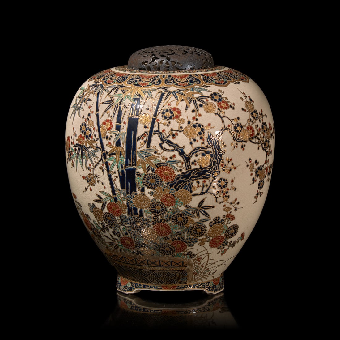 A Japanese Gosu Blue-Decorated Satsuma Jar, Kyokusan, and Associated Silver Cover, Meiji Period: A Japanese Gosu Blue-Decorated Satsuma Jar, Kyokusan, and Associated Silver Cover, Meiji Period Late Meijing Period The ovoid body resting on three short tripod feet, the exterior decorated with chrys