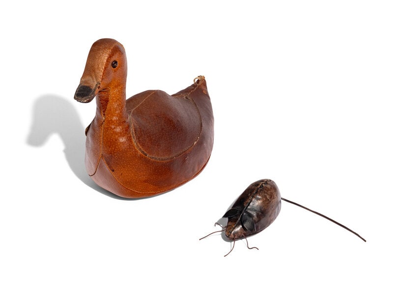 Omersa Second Half 20th Century Leather Duck-Form Doorstop and Mouse-Form Paperweight : Omersa Second Half 20th Century Leather Duck-Form Doorstop and Mouse-Form Paperweight sticker remnant on underside of mouse duck | 13 1/4 w x 9 3/4 h x 5 3/4 d inches. This lot is