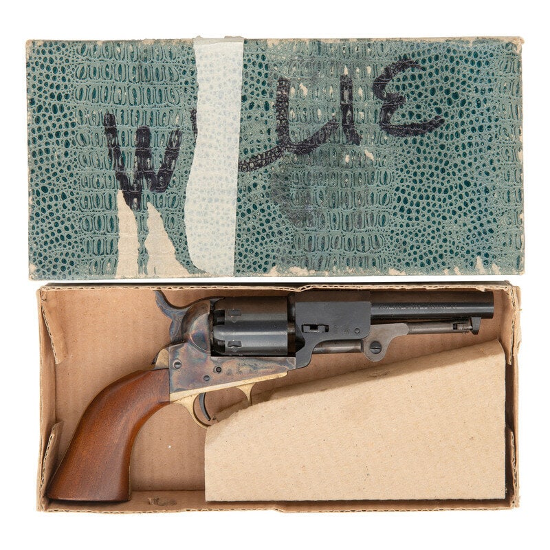 ASM Colt 1849 Pocket Revolver: ASM Colt 1849 Pocket Revolver .31 Cal. 4" barrel length. SN: 35334. Blued and casehardened finish with brass gripstraps, one piece walnut grips, and octagonal to round barrel. Single action six-shot p