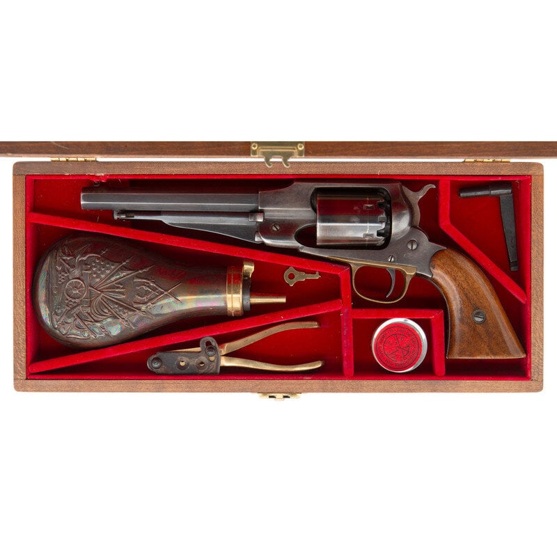 Cased Navy Arms Replica Remington New Model Army Revolver with Accessories: Cased Navy Arms Replica Remington New Model Army Revolver with Accessories .44 Cal. 6.5" barrel length. SN: 82. Blued metal finish with casehardened hammer and brass triggerguard mounting walnut two-p