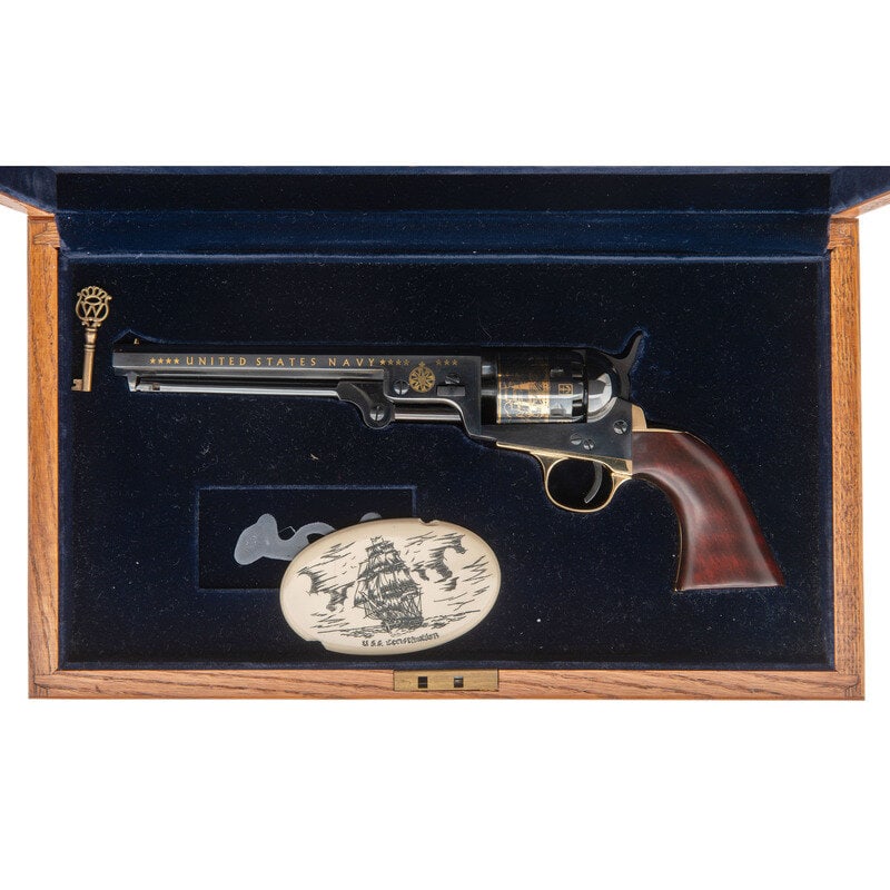 ASM 1851 Navy U.S. Navy Commemorative .36 Cal : ASM 1851 Navy U.S. Navy Commemorative .36 Cal .36 Cal. 7.5" barrel length. SN: 948. Polished blued finish with gold plated gripstraps and inlaid gold commemorative markings on the barrel and cylinder,
