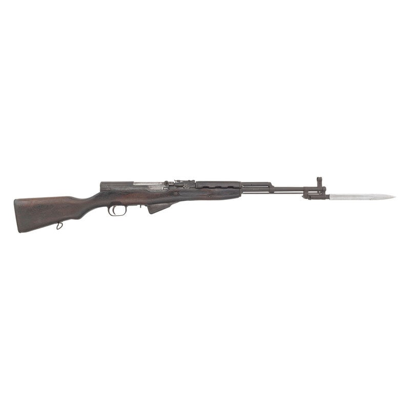 **Factory 26 Chinese Type 56 SKS, Possible Vietnam Bringback: **Factory 26 Chinese Type 56 SKS, Possible Vietnam Bringback Vietnam War 7.62x39mm. 20.5" barrel length. SN: 299282. Blued metal finish transitioned to brown patina with shortened wood stock. Short st