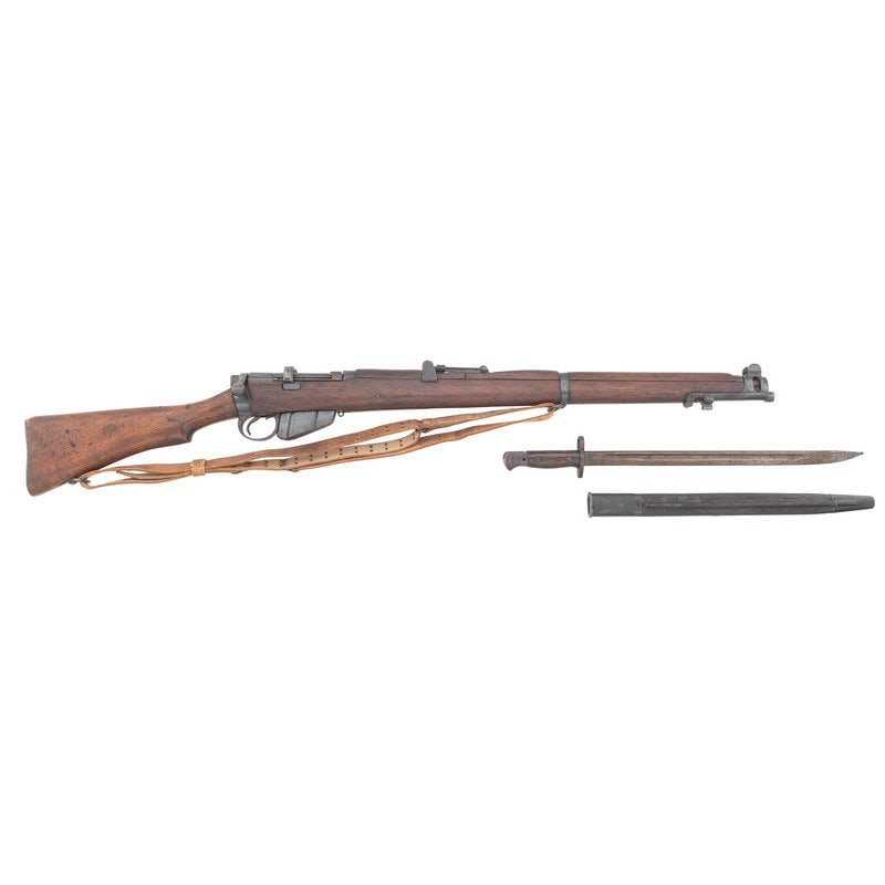 **G.R.I. Enfield No 1 MKIII* Rifle Dated 1944 with Bayonet: **G.R.I. Enfield No 1 MKIII* Rifle Dated 1944 with Bayonet World War II .303 British. 25.2" barrel length. SN: 96992H. Blued metal finish with polished bolt in walnut semi-pistol grip stock with full