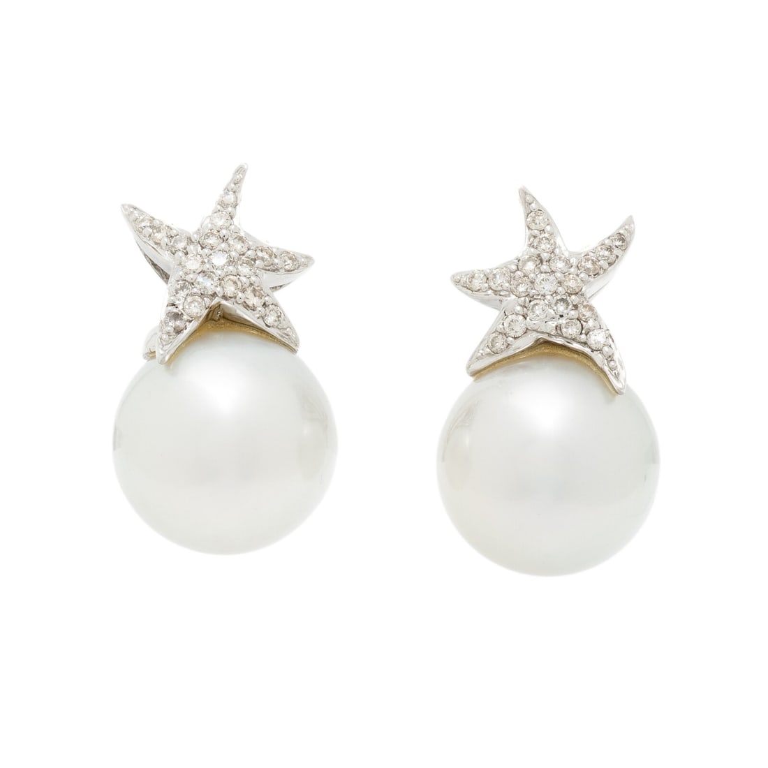 CULTURED PEARL AND DIAMOND EARRINGS: CULTURED PEARL AND DIAMOND EARRINGS Cultured pearls measuring approximately 12.50 mm and round diamonds. 18 karat white gold. 7/8 inch long. Stamp: 2868 K18. Gross weight: 6.90 dwt. Sold for the benef