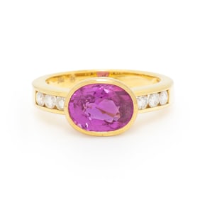 PINK SAPPHIRE, DIAMOND, AND YELLOW GOLD RING
