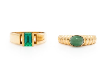 TWO YELLOW GOLD AND EMERALD RINGS