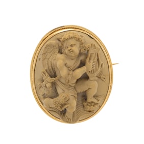 LAVA CAMEO AND YELLOW GOLD BROOCH