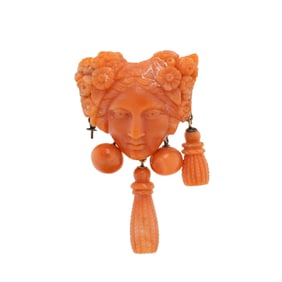 ANTIQUE, CARVED CORAL AND YELLOW GOLD BROOCH