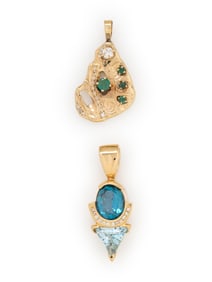 TWO YELLOW GOLD AND DIAMOND PENDANTS WITH BLUE TOPAZ AND EMERALDS