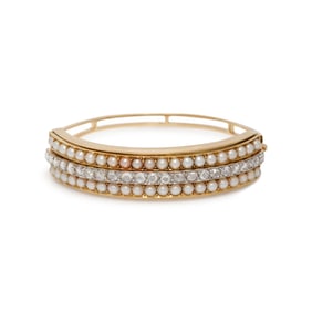 YELLOW GOLD, DIAMOND, AND CULTURED PEARL BANGLE BRACELET