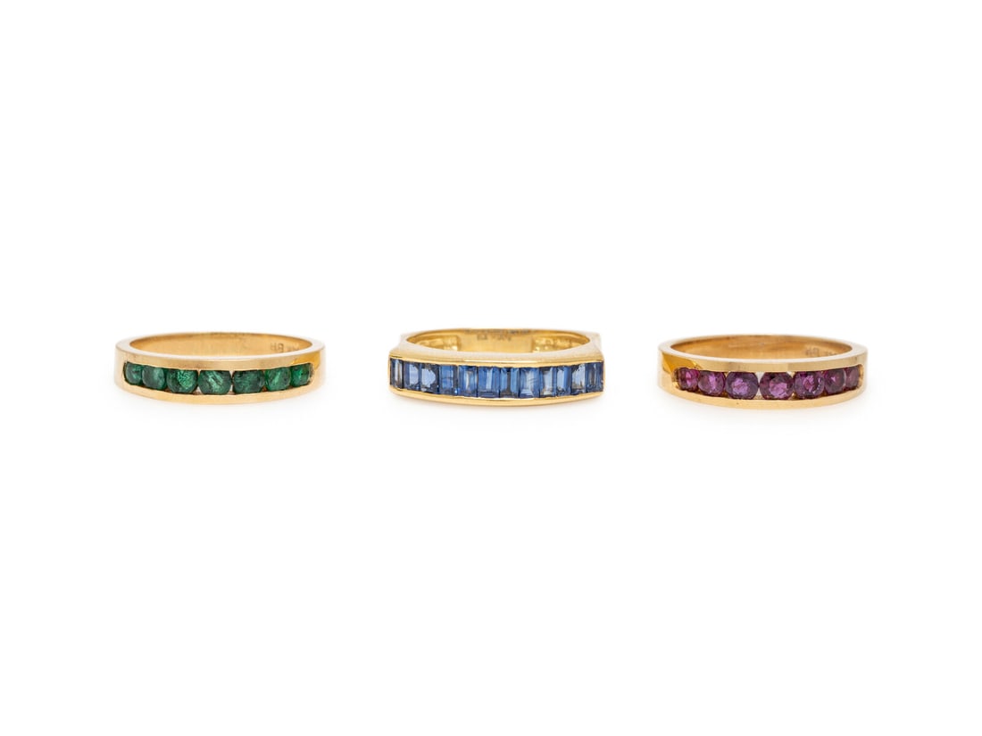 COLLECTION OF THREE RUBY, EMERALD, SAPPHIRE, AND YELLOW GOLD RINGS (1 of 3)