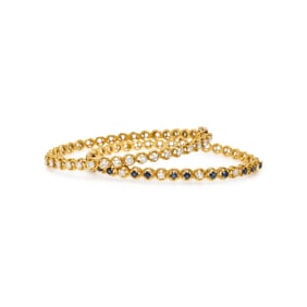 PAIR OF DIAMOND, SAPPHIRE, AND YELLOW GOLD BANGLE BRACELETS