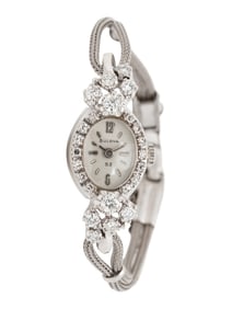 BULOVA, 14K WHITE GOLD AND DIAMOND DRESS WATCH