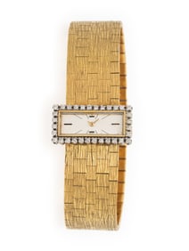 VACHERON & CONSTANTIN, 18K YELLOW GOLD BACKWIND WATCH WITH DIAMOND BEZEL