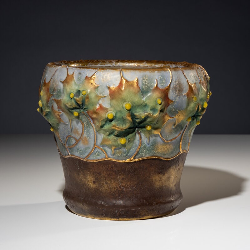 Amphora Pottery Co. Early 20th Century Amphora Jardinière with Art Nouveau Leaf motif : Amphora Pottery Co. Early 20th Century Amphora Jardinière with Art Nouveau Leaf motif glazed earthenware stamped 'Amphora Austria' to underside Height 7 x diameter 8 inches. This lot is l