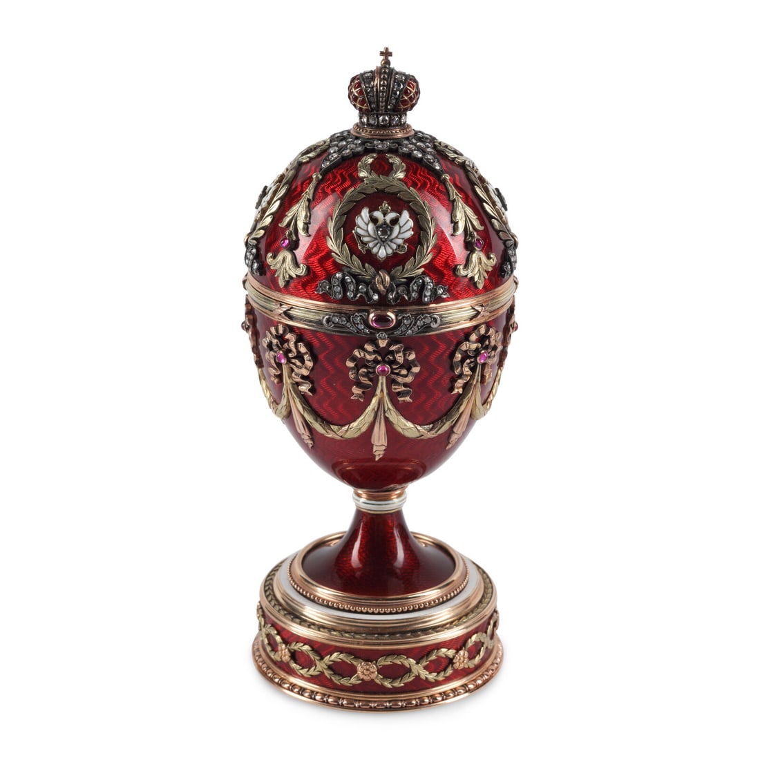 A 14-Karat Gold, Diamond, Gemstone and Guilloché Enamel Surprise Egg: A 14-Karat Gold, Diamond, Gemstone and Guilloché Enamel Surprise Egg 20th Century the lid opening to a carved hardstone elephant on a guilloche enamel decorated platform. with rubbed marks throug