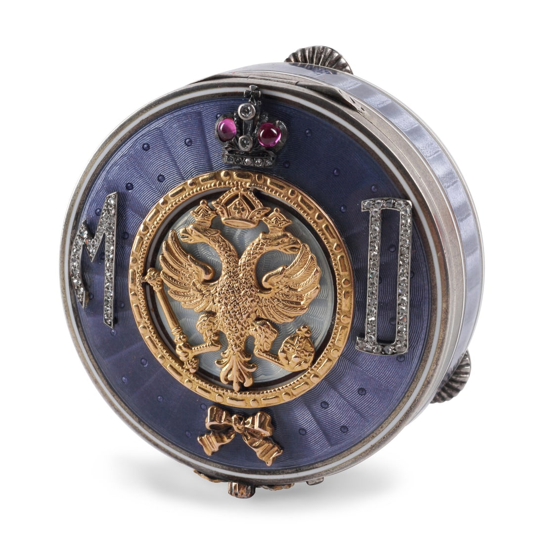 A Silver, Gold, Guilloché Enamel, Diamond and Ruby-Mounted Box: A Silver, Gold, Guilloché Enamel, Diamond and Ruby-Mounted Box 20th Century 2 ozt 13 dwt gross Height 7/8 x diameter 2 1/8 inches. This lot is located in Chicago.