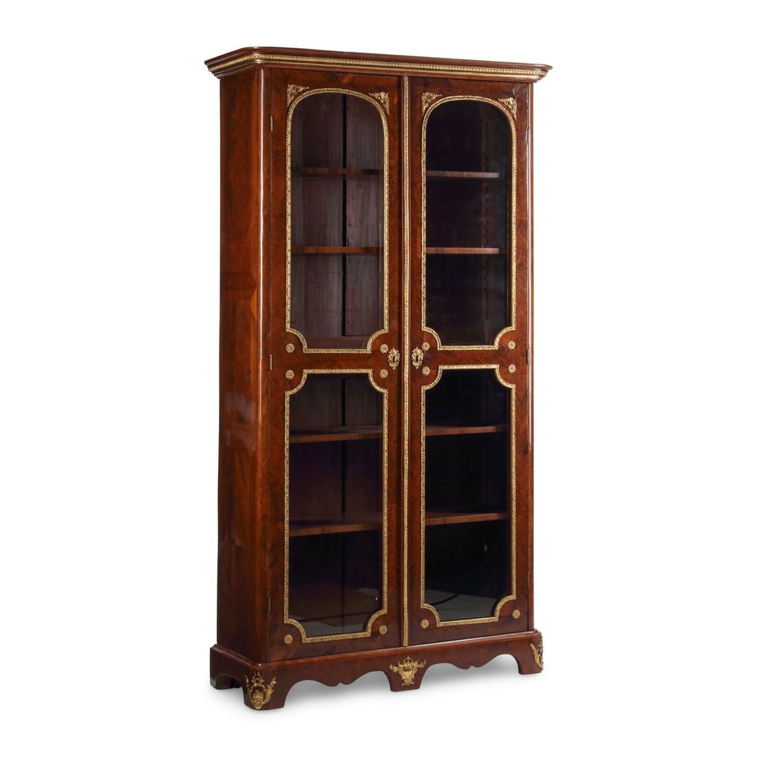 A Régence Gilt Bronze Mounted Rosewood Vitrine Cabinet: A Régence Gilt Bronze Mounted Rosewood Vitrine Cabinet 18th Century Height 89 1/2 x width 47 x depth 16 1/2 inches. This lot is located in Chicago.