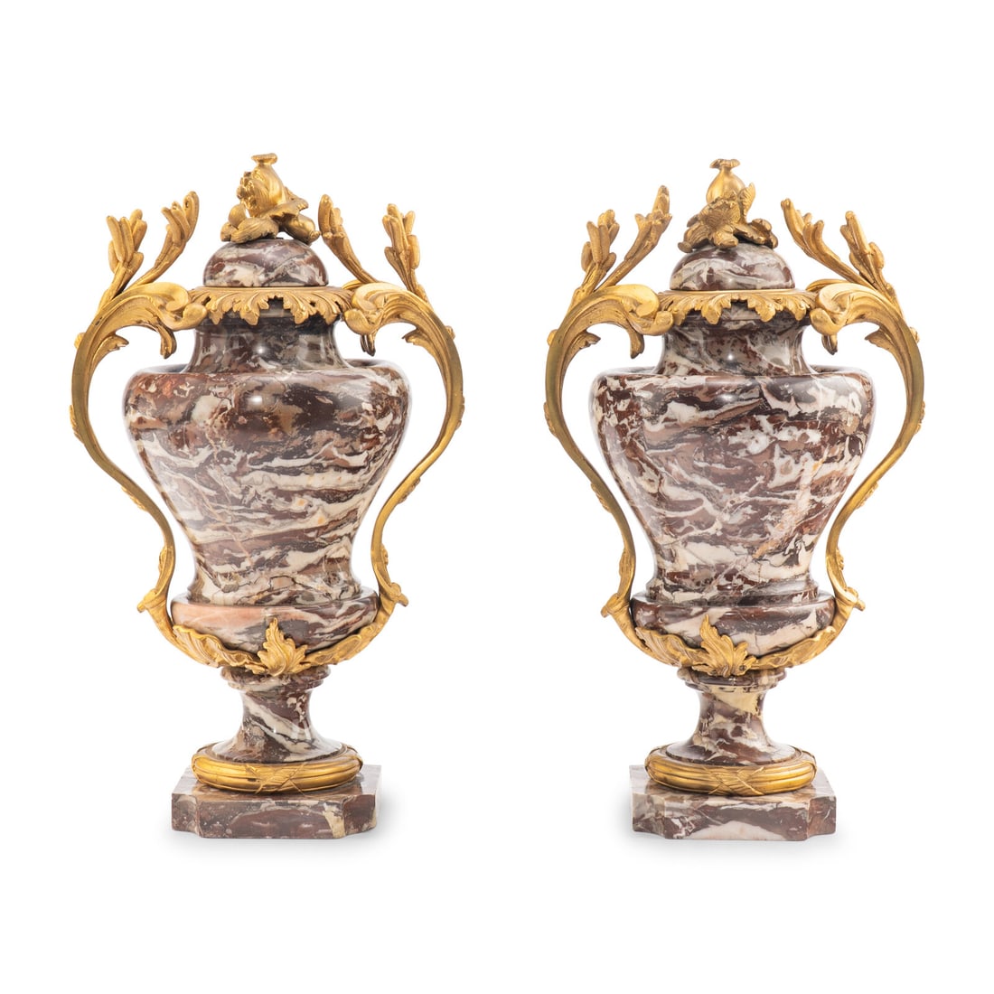A Pair of French Gilt Bronze Mounted Marble Urns: A Pair of French Gilt Bronze Mounted Marble Urns 19th Century Height 21 1/2 x width 12 x depth 9 inches. Property from the Collection of Richard and Deanna Freeland This lot is located in Chicago.