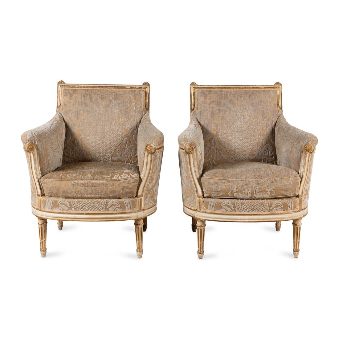 A Pair of Louis XVI Cream-Painted and Parcel Gilt Bergères: A Pair of Louis XVI Cream-Painted and Parcel Gilt Bergères Late 18th Century each stamped CARLHIAN. Height 35 x width 29 x depth 32 inches. Property of a Main Line Gentleman, Pennsylvania This lo