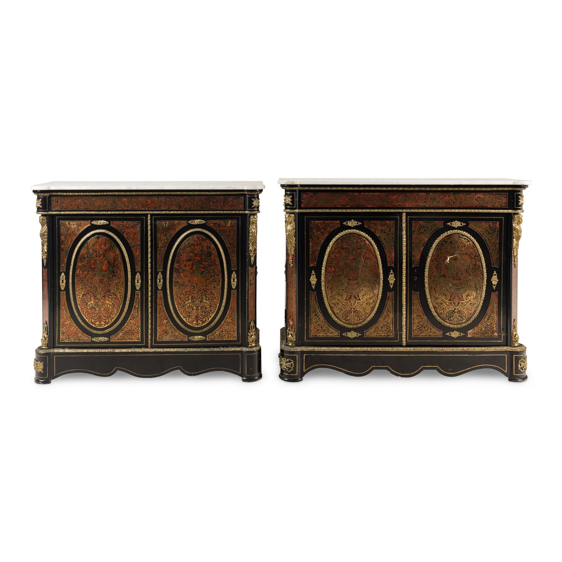 A Near Pair of Napoleon III Boulle Marquetry Marble-Top Side Cabinets: A Near Pair of Napoleon III Boulle Marquetry Marble-Top Side Cabinets Late 19th Century Height of taller example 43 3/4 x width 55 1/2 x depth 17 inches. Property from the Collection of Daniel Listek