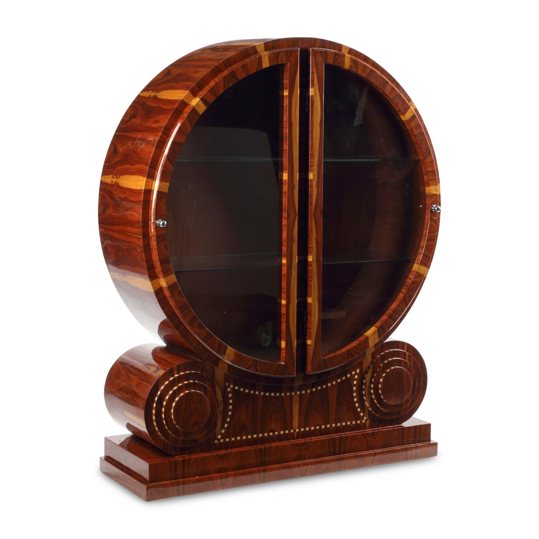 A Continental Various Woods Veneered Circular Vitrine Cabinet: A Continental Various Woods Veneered Circular Vitrine Cabinet Late 20th Century Height 61 x width 48 x depth 16 inches. This lot is located in Chicago.