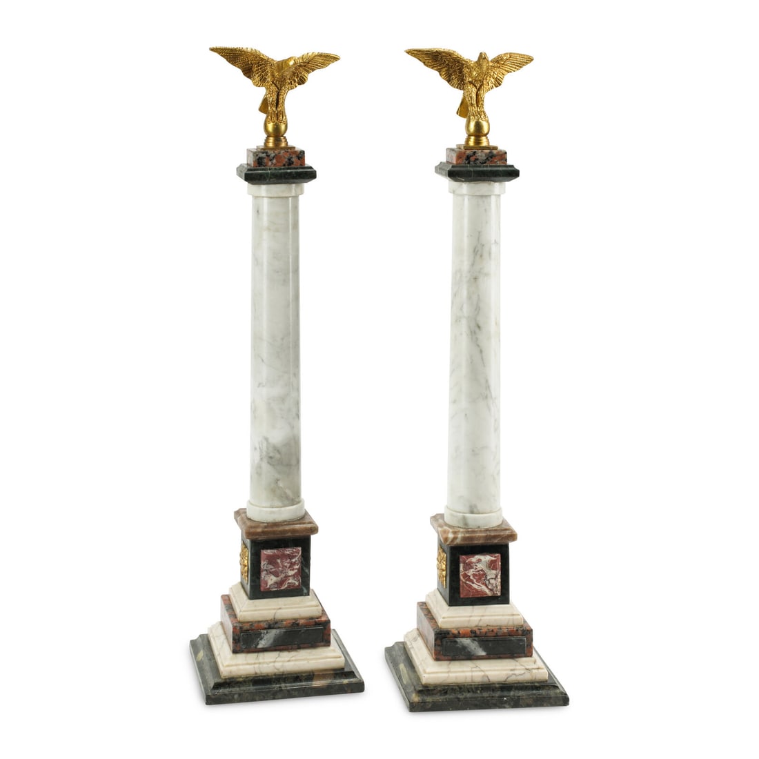 A Pair of Italian Grand Tour Style Marble Column Ornaments: A Pair of Italian Grand Tour Style Marble Column Ornaments 20th Century with gilt bronze eagle finials. Height 27 x width 6 1/2 x depth 6 1/2 inches. This lot is located in Chicago.