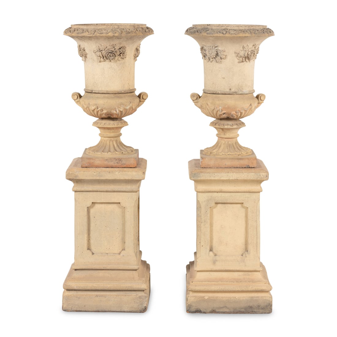 A Pair of Terra Cotta Garden Urns and Plinths: A Pair of Terra Cotta Garden Urns and Plinths 20th Century Height overall 47 1/2 inches. This lot is located in Chicago.