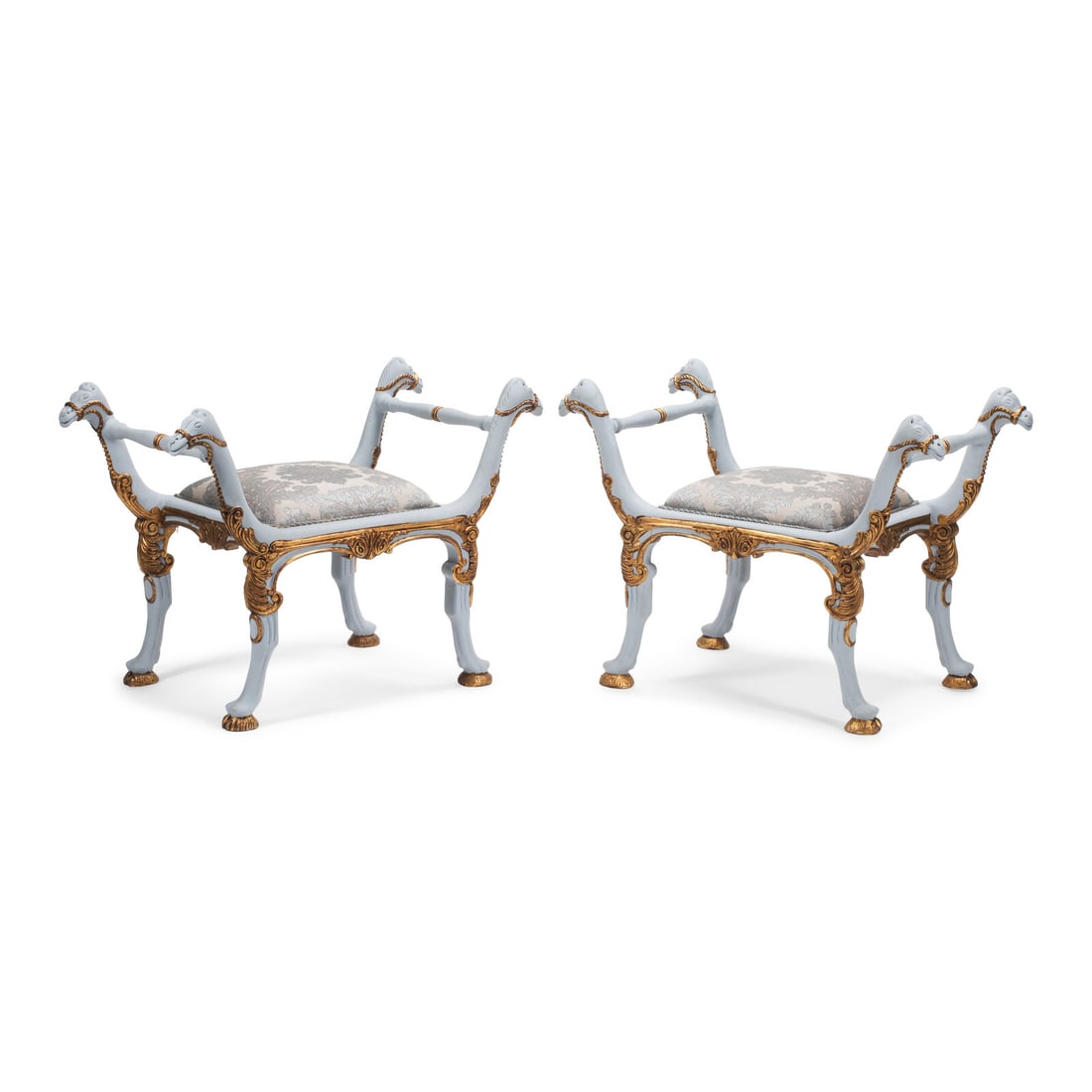 A Pair of Italian Painted and Parcel-Gilt Camel-Motif Benches: A Pair of Italian Painted and Parcel-Gilt Camel-Motif Benches 20th Century Height 27 x width 36 x depth 20 inches. This lot is located in Chicago.
