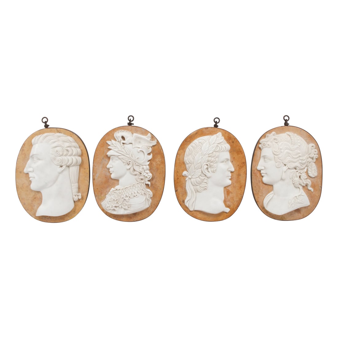 A Set of Four Carved Marble and Iron Mounted Profile Plaques: A Set of Four Carved Marble and Iron Mounted Profile Plaques 20th Century Height 24 x width 18 inches. This lot is located in Chicago.