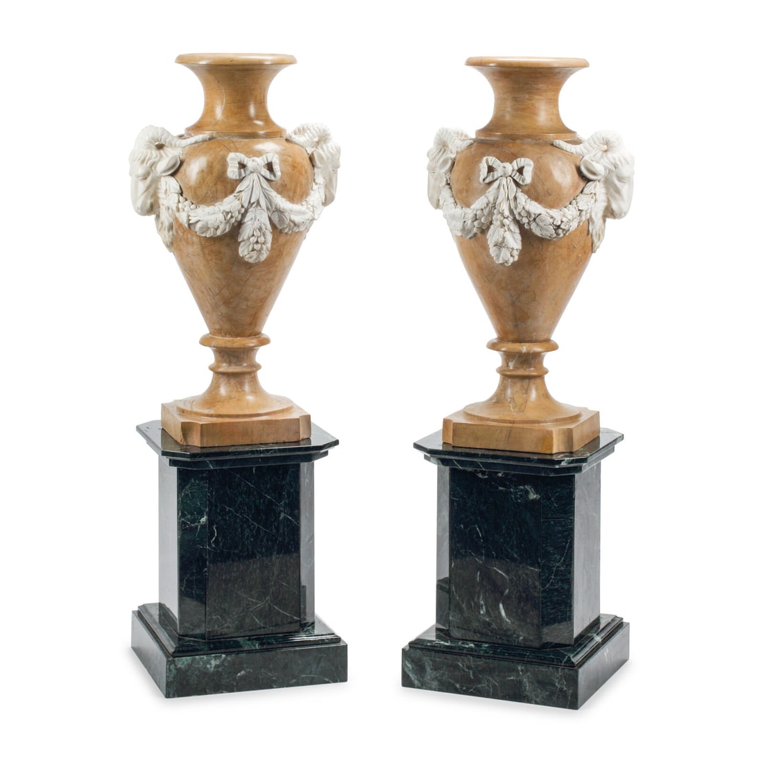 A Pair of Italian Carved Marble Vases on Stands: A Pair of Italian Carved Marble Vases on Stands 20th Century Height overall (including stands) 51 1/2 inches; height of vases 32 x width over handles 18 inches. This lot is located in Chicago.