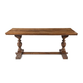 A Continental Parcel-Gilt Walnut Refectory Table