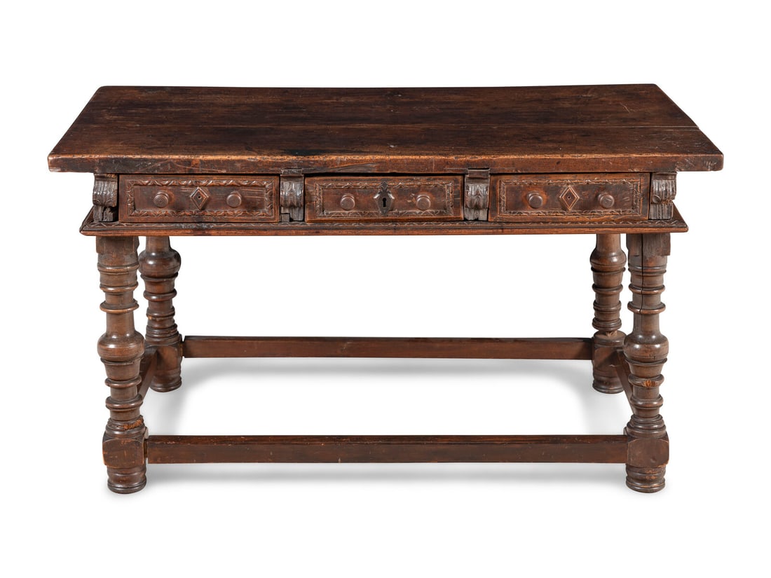 A Spanish Baroque Walnut Table: A Spanish Baroque Walnut Table 17th/18th Century and Later Height 32 1/2 x width 57 1/2 x depth 30 1/4 inches. This lot is located in Chicago.