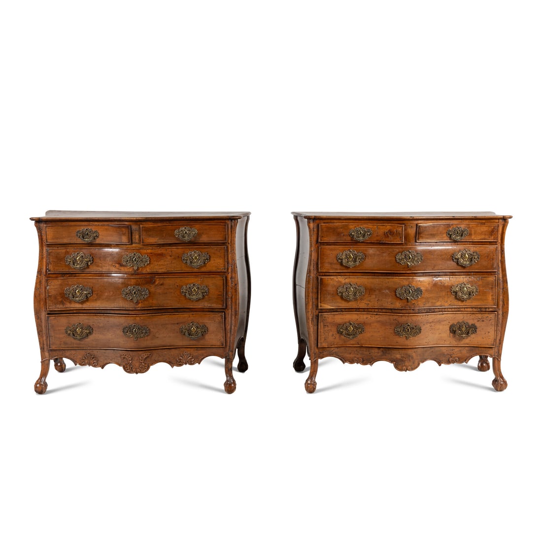 A Pair of Continental Walnut Chests of Drawers: A Pair of Continental Walnut Chests of Drawers Possibly Spanish or Portuguese, 18th Century Height 43 x width 52 1/2 x depth 25 inches. Property from the Collection of the Werner Family