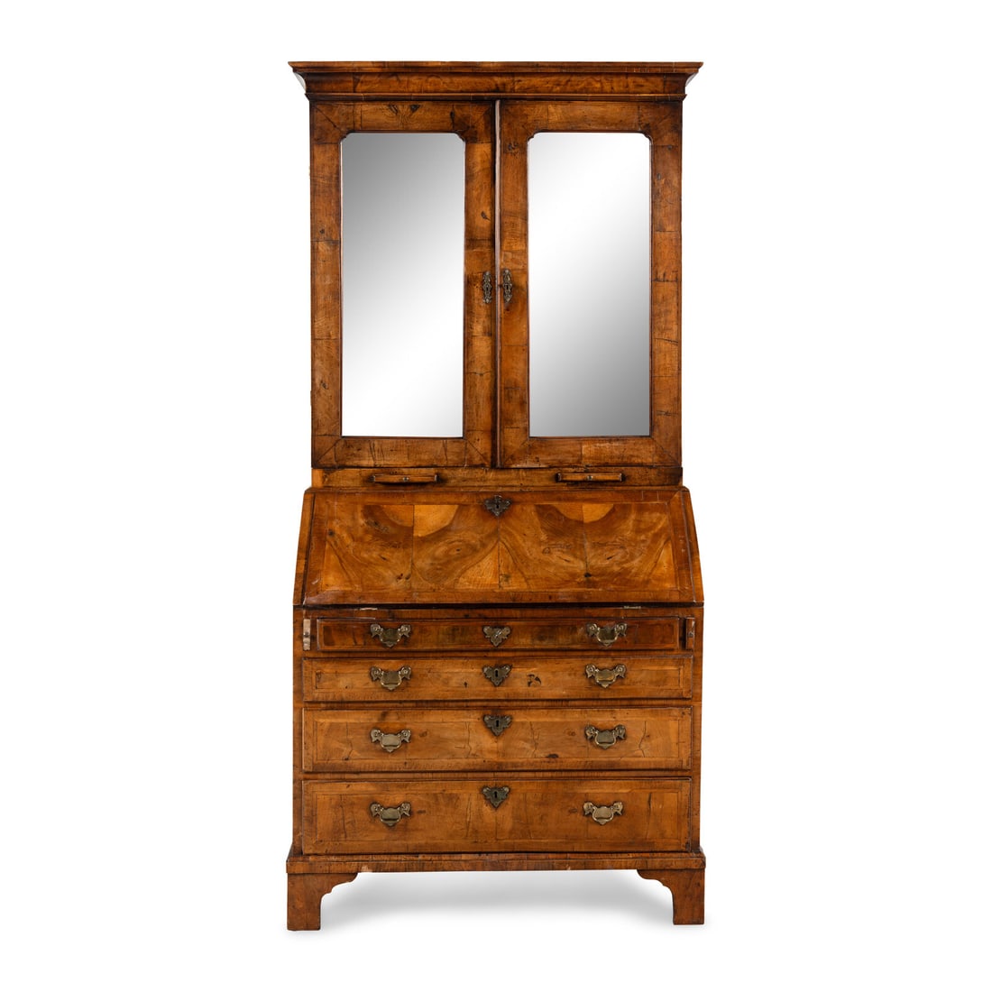 A George II Walnut Secretary Bookcase: A George II Walnut Secretary Bookcase 18th Century Height 80 1/2 x width 38 1/4 x depth 21 1/4 inches. Property from the Estate of George Burrows, Illinois This lot is located in Chicago. Provenance: