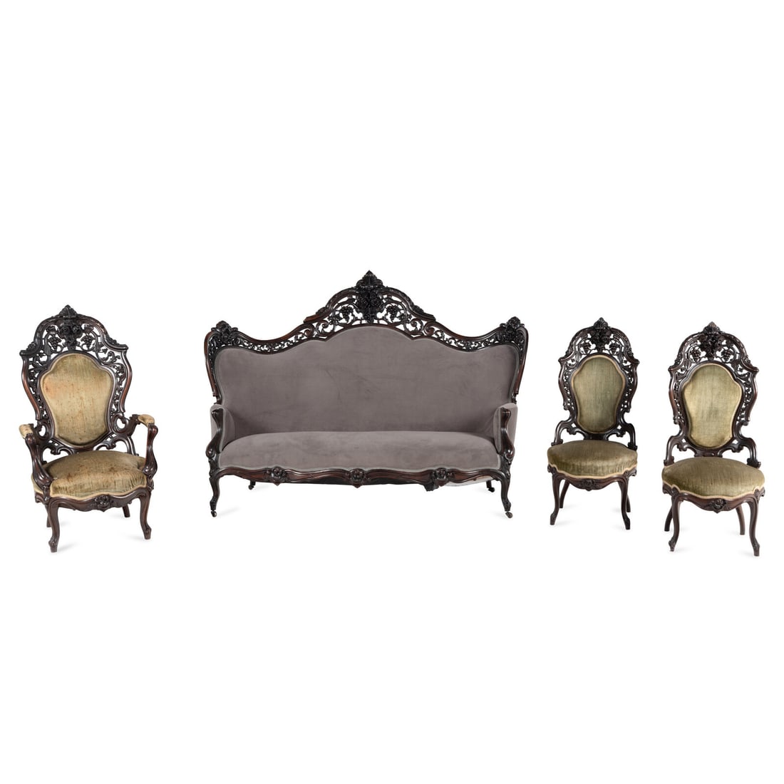 A Renaissance Revival Rosewood Four-Piece Seating Suite: A Renaissance Revival Rosewood Four-Piece Seating Suite By Joseph Meeks and Sons, New York, Circa 1859 in the Hawkins pattern, comprising a sofa, arm chair and a pair of side chairs; the sofa's interi