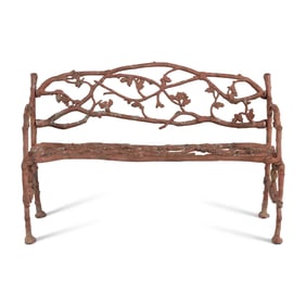 A Victorian Patinated Iron "Rustic" Garden Bench