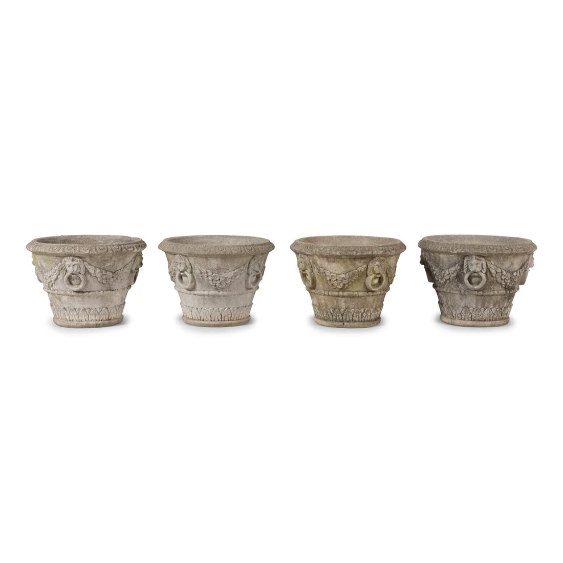 A Set of Four Cast Stone Jardinières: A Set of Four Cast Stone Jardinières 20th Century Height 14 x diameter 18 inches. This lot is located in Chicago. Provenance: Estate of Christel DeHaan, Indianapolis, Indiana Acquired from the ab