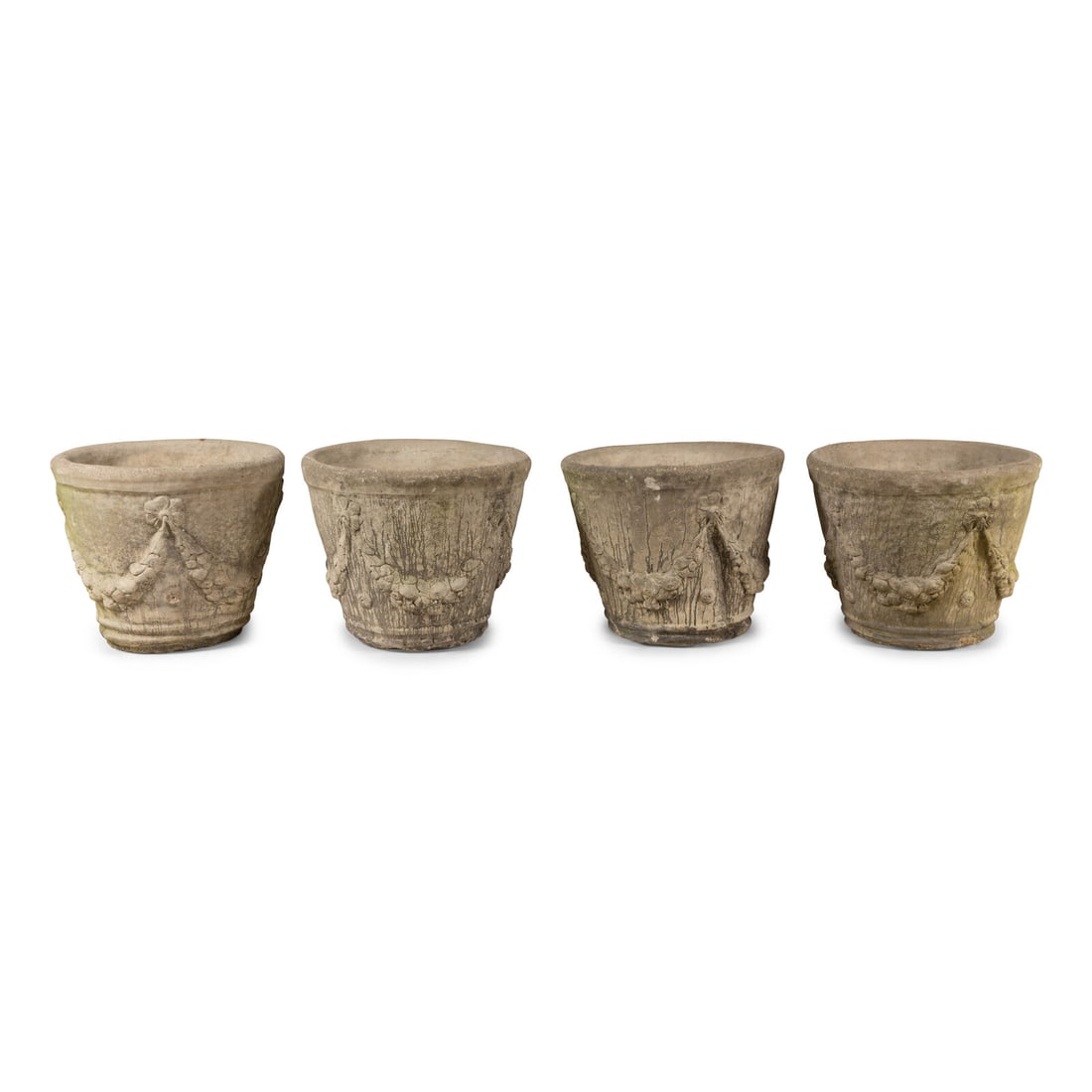A Set of Four Cast Stone Jardinières: A Set of Four Cast Stone Jardinières 20th Century Height 19 x diameter 22 inches. This lot is located in Chicago. Provenance: Estate of Christel DeHaan, Indianapolis, Indiana Acquired from the ab