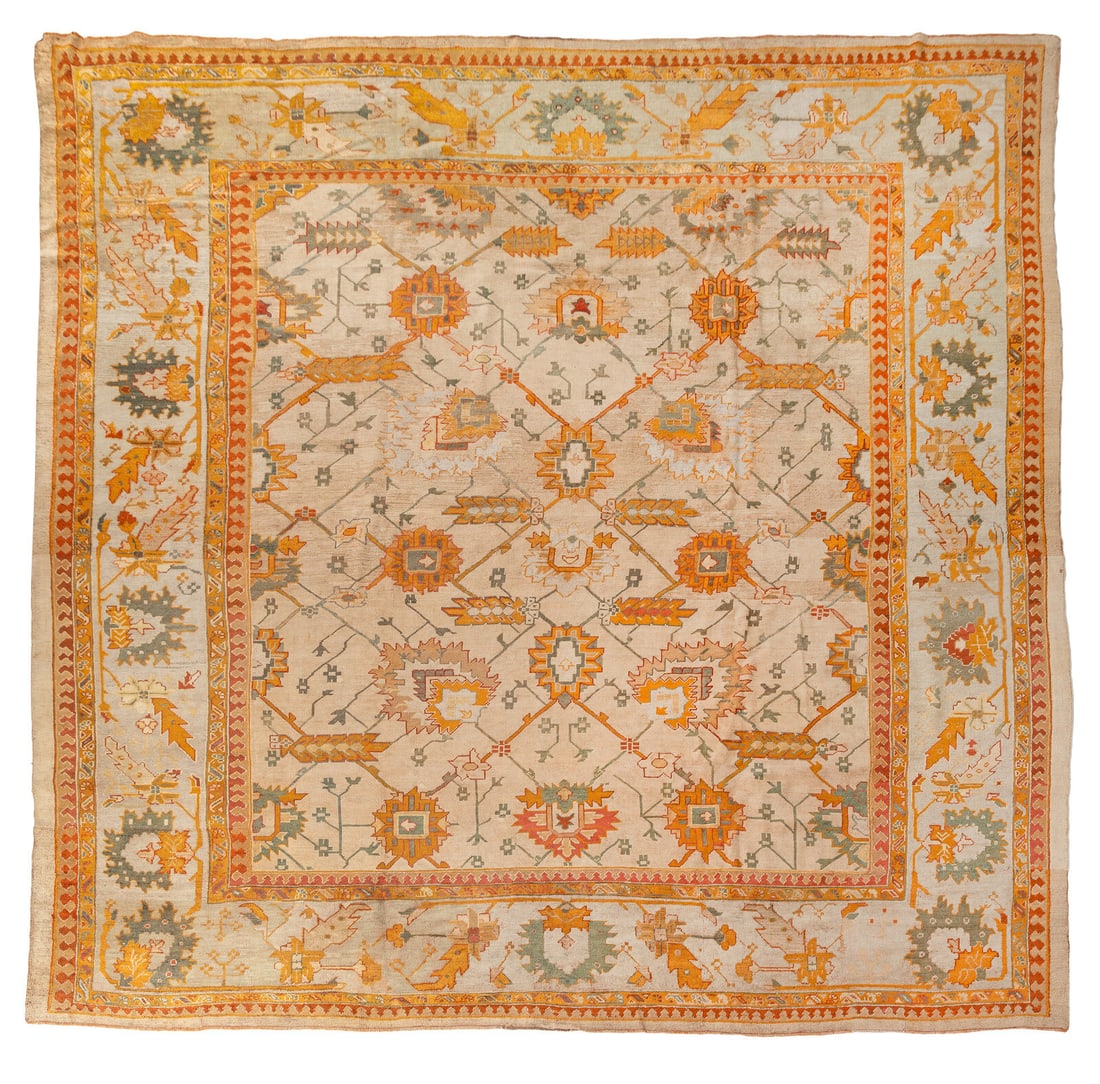An Oushak Carpet: An Oushak Carpet Late 19th Century 14 feet 2 inches x 13 feet 3 inches. Property from a Private Family Trust This lot is located in Chicago.