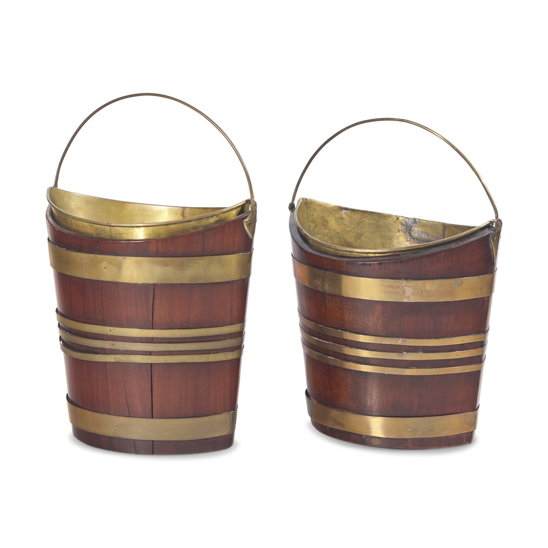Two Similar George III Brass-Bound Mahogany Peat Buckets: Two Similar George III Brass-Bound Mahogany Peat Buckets Late 18th / Early 19th Century Height 14 1/2 x width 14 x depth 10 inches. Property from a Private Collection, New York, New York This lot is l