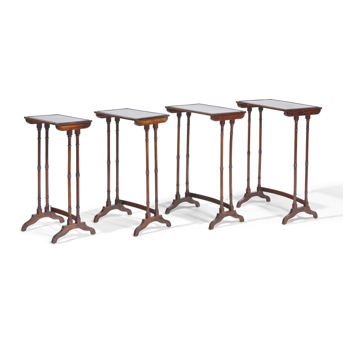 A Set of Regency Rosewood Quartetto Nesting Tables: A Set of Regency Rosewood Quartetto Nesting Tables Circa 1820 Height 30 x width 20 x depth 12 3/4 inches (largest table). This lot is located in Philadelphia. Provenance: A New York collection.
