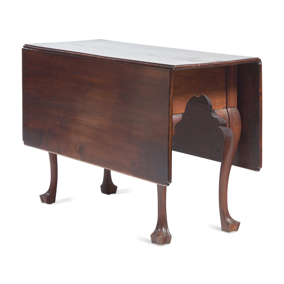 A Chippendale Carved Walnut Drop-Leaf Dining Table: A Chippendale Carved Walnut Drop-Leaf Dining Table Philadelphia, Pennsylvania, Circa 1760-1780 the leaves with notched corners, shaped apron, on cabriole legs ending in trifid feet. Height 28 1/2 x wi