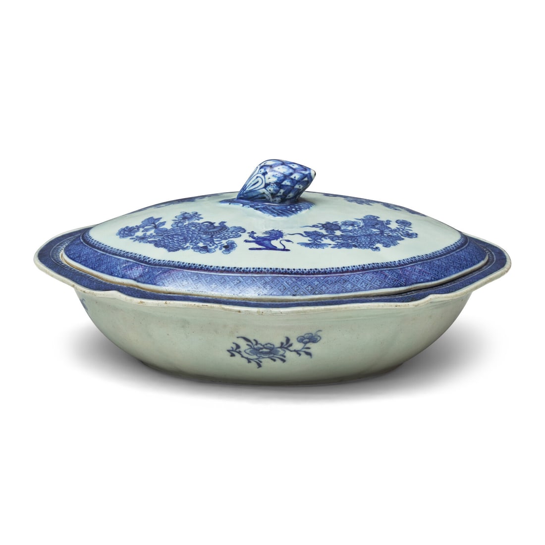 A Chinese Export Porcelain Fitzhugh Covered Vegetable Dish: A Chinese Export Porcelain Fitzhugh Covered Vegetable Dish Late 18th Century bearing armorial crest in the form of a rampant lion. Height 4 1/2 x width 11 1/4 x depth 9 1/2 inches. This lot is located